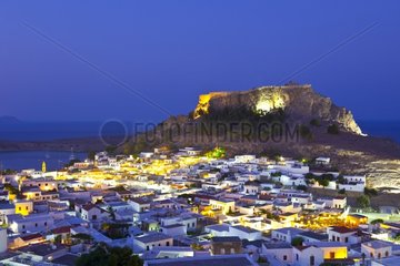 Acropolis of Lindos Village on hill at night Rhodes Greece