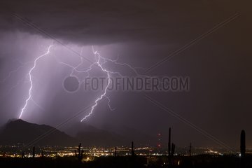 Double lightning strike hitting the Rincon Mountains USA