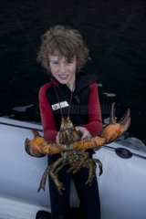 Boy with a lobster Quebec Canada