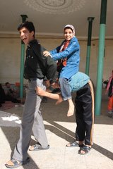 Children playing leapfrog in Chak Chak in Iran