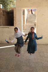 Children playing jump rope in Chak Chak in Iran