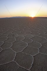 Salt lake during the dry season at sunset in Iran