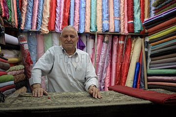 Seller of tissue in the Teheran bazaar of Iran