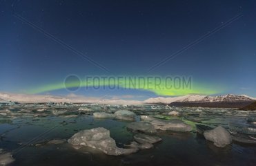 Aurora on the glacier lake Jokulsarlon Iceland