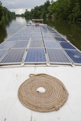 Solar panels on a barge on the River Lot France