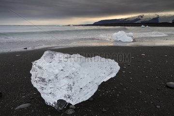 Ice of Lake Joekulsárlón stranded on a beach Iceland