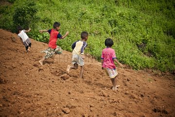 Children playing in the ground near Pai Thailand