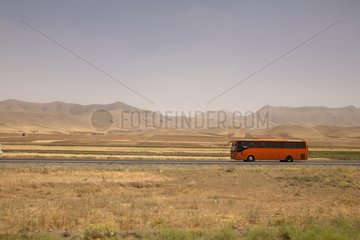 Bus on a road between Isfahan and Hamedan Iran