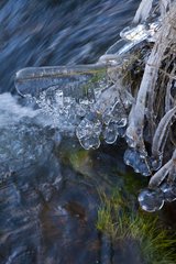 Frozen river in the forest of Rifrio Spain