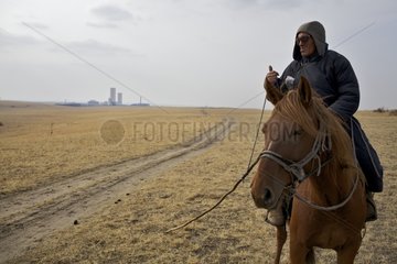 Shepher and plant Mongolian steppe in Inner Mongolia