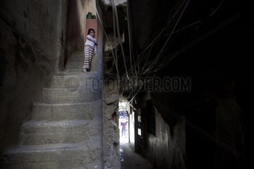 Girl in a stairwell Camp Sabra and Shatila in Lebanon