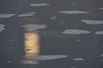 Reflection of the moon on the ice in Greenland was East Coast