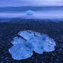 Ice on the shore of glacial lake Joekulsárlón Iceland