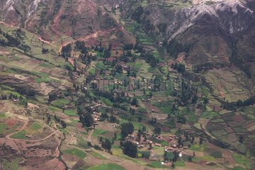 Village and fields in a valley in Peru Andes