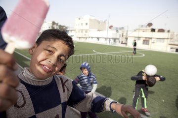 Palestinian children playing football in Jordan