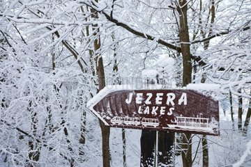 Sign under the snow at Plitvice lakes NP in Croatia