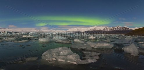 Aurora on Joekulsárlón glacial lake in Iceland