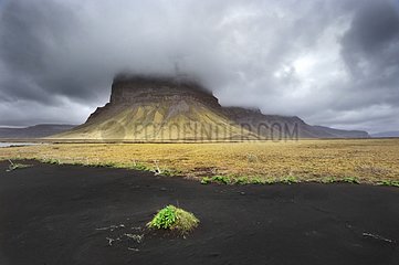 Lomagnupur cliff in Iceland clouds