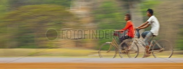 People bicycles Angkor Thom Cambodia