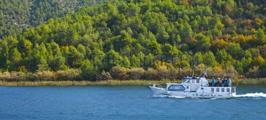 Boat on River Krka in autumn Dalmatia Croatia