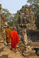Buddhist monks at the Bayon temple at Angkor in Cambodia