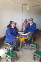 Elderly playing majung Yunnan China