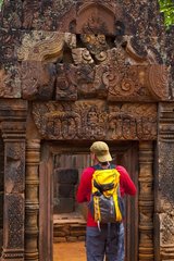 Tourist at Banteay Srei temple at Angkor in Cambodia