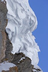 Snowdrift on rock - Swiss Alps