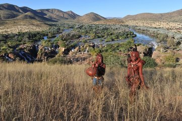 Himbas girls fetching water ensuring Namibia