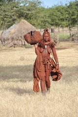 Himba woman starting a trip in Namibia