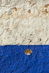 Blue and white paint on a wall La Mancha Spain