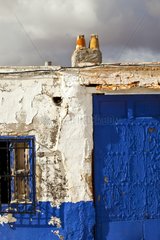 Blue and white wall of a house La Mancha Spain