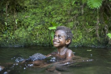 Children bathing in the river - Tanna Island Vanuatu