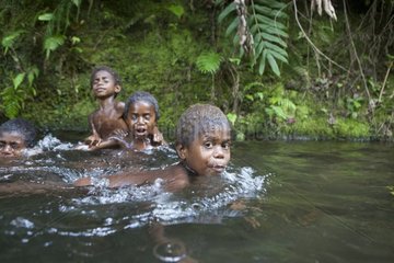 Children bathing in the river - Tanna Island Vanuatu