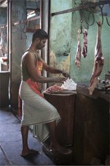 Butcher at work Market Goubert Tamil Nadu India