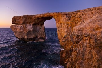 Azur window natural arch at sunset Gozo Malta