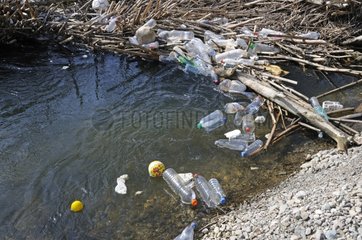 Plastic bottles on Savoureuse river Franche-Comté France