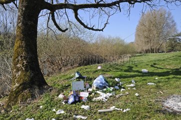 Trash left along the Doubs Franche-Comte France