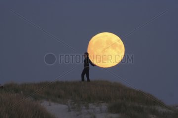 Person giving the feel of the moon on her back