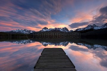 Reflection of sunrise over Sawtooth mountains USA