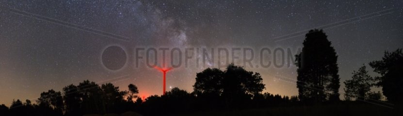 Constellations over a wind turbine