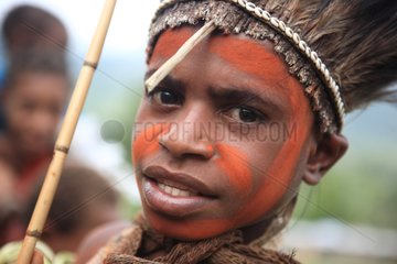 Boy with feather headdress Papua New-Guinea