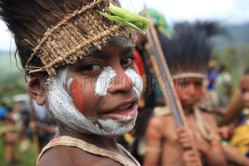 Boy with feather headdress Papua New-Guinea