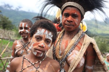 Boys with cap and paint Papua New-Guinea