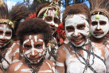 Women with cap and paint Papua New-Guinea