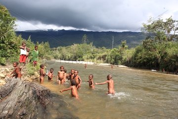 Children playing in the Sepik River Papua New-Guinea