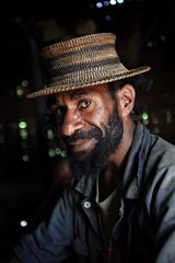 Man wearing a traditional hat Papua New-Guinea
