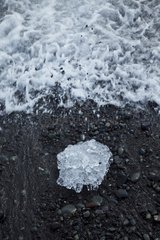 Lake ice breaking on the beach Joekulsárlón Iceland