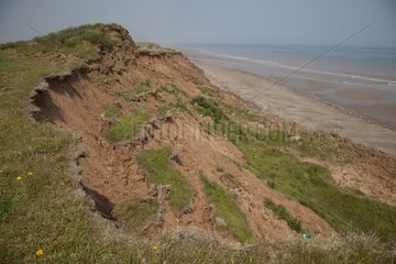 Coastal erosion on cliffs East Newton Yorkshire UK