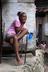 Teenager in a slum Western New-Guinea